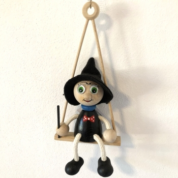 Panáček kouzelník na houpačce