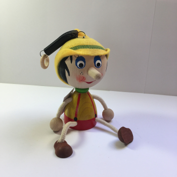 Pinocchio na pružině velká hlava