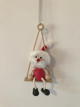 Santa Claus na houpačce